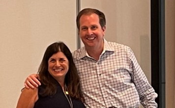 New CEO of UKG Vows to Expand By Flipping A Catch-22 Moment To Its Advantage Chris Todd, the new CEO of UKG, is presented with a champion belt by Jennifer Brafman Staffen of UKG Corporate Communications during a June 2022 Analyst Relations event in Fort Lauderdale, FL